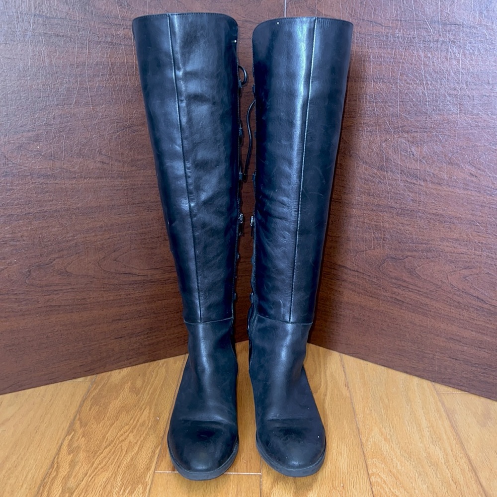 Black knee-high riding boots